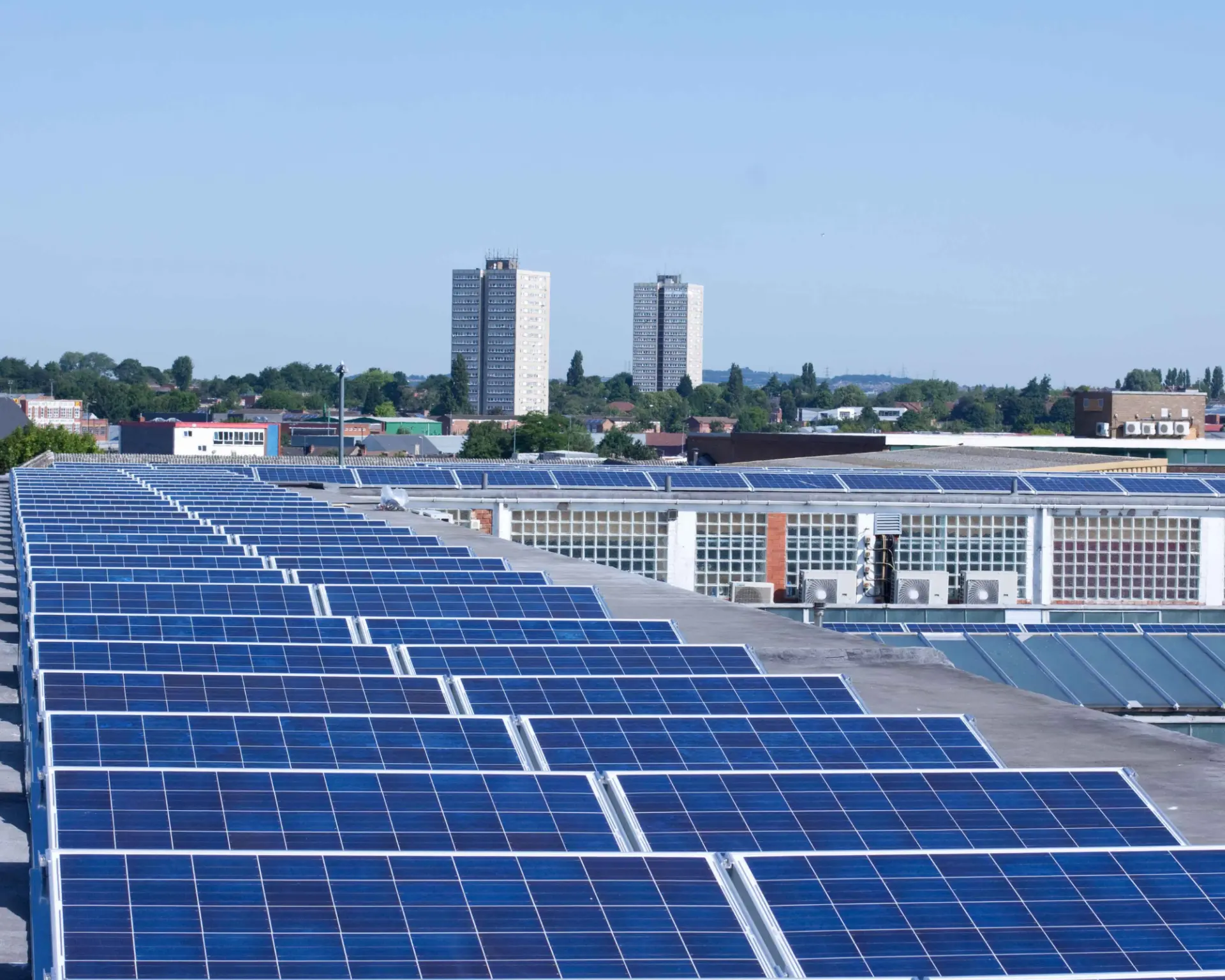 Commercial solar PV array installed on a large warehouse rooftop